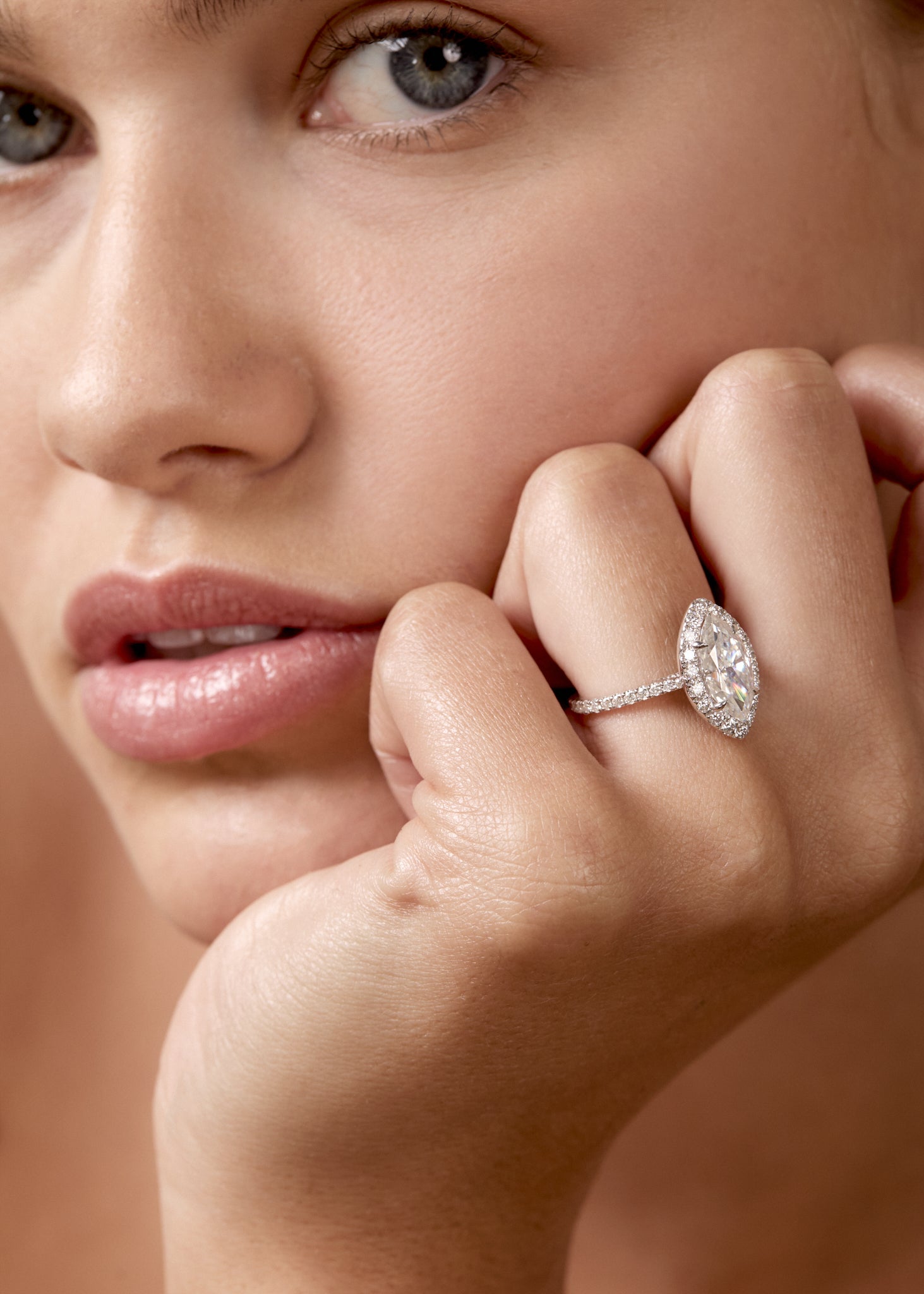 Size Marquise Halo Engagement Ring set in 18k White Gold