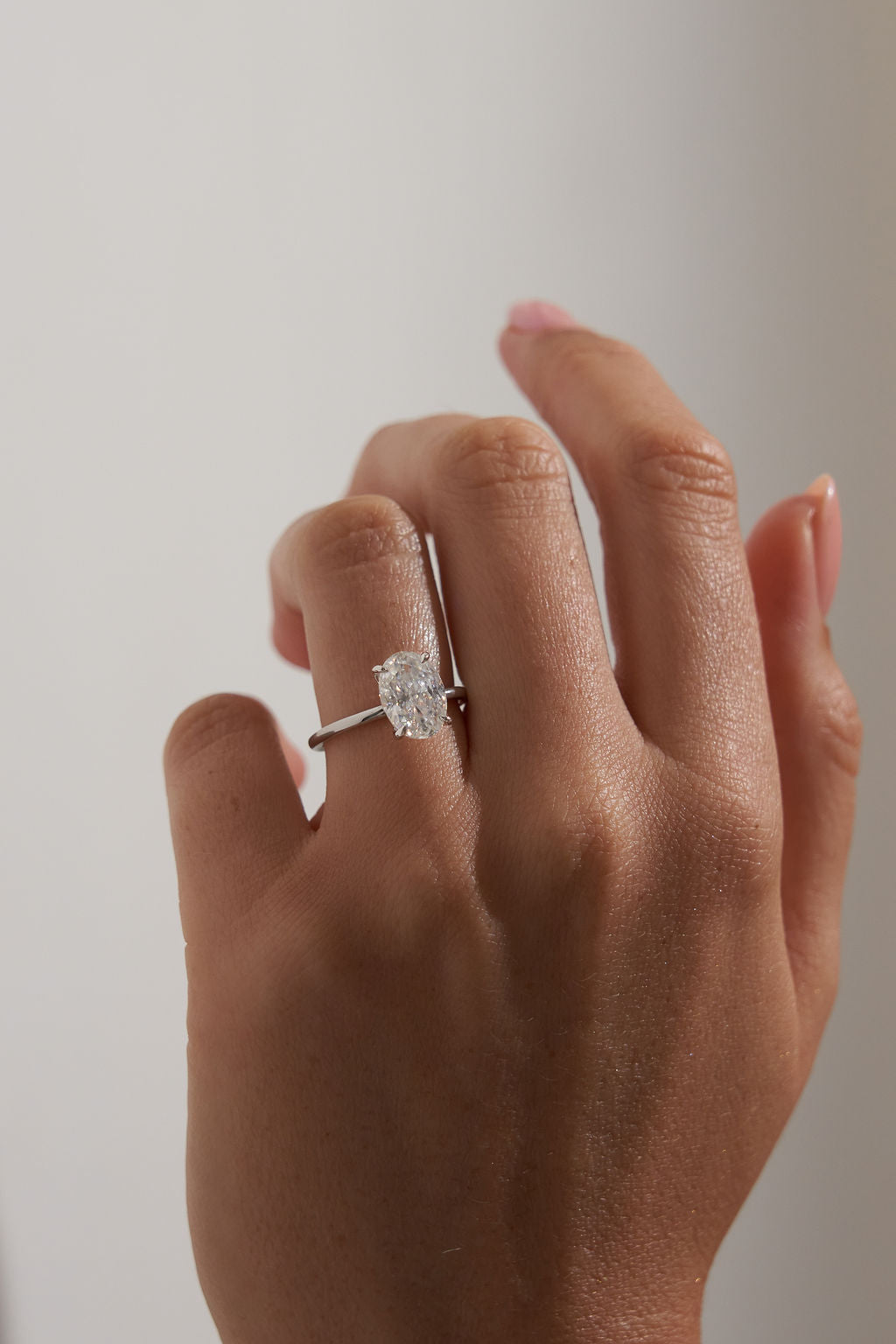 4.5 Oval Solitaire Engagement Ring 18k White Gold