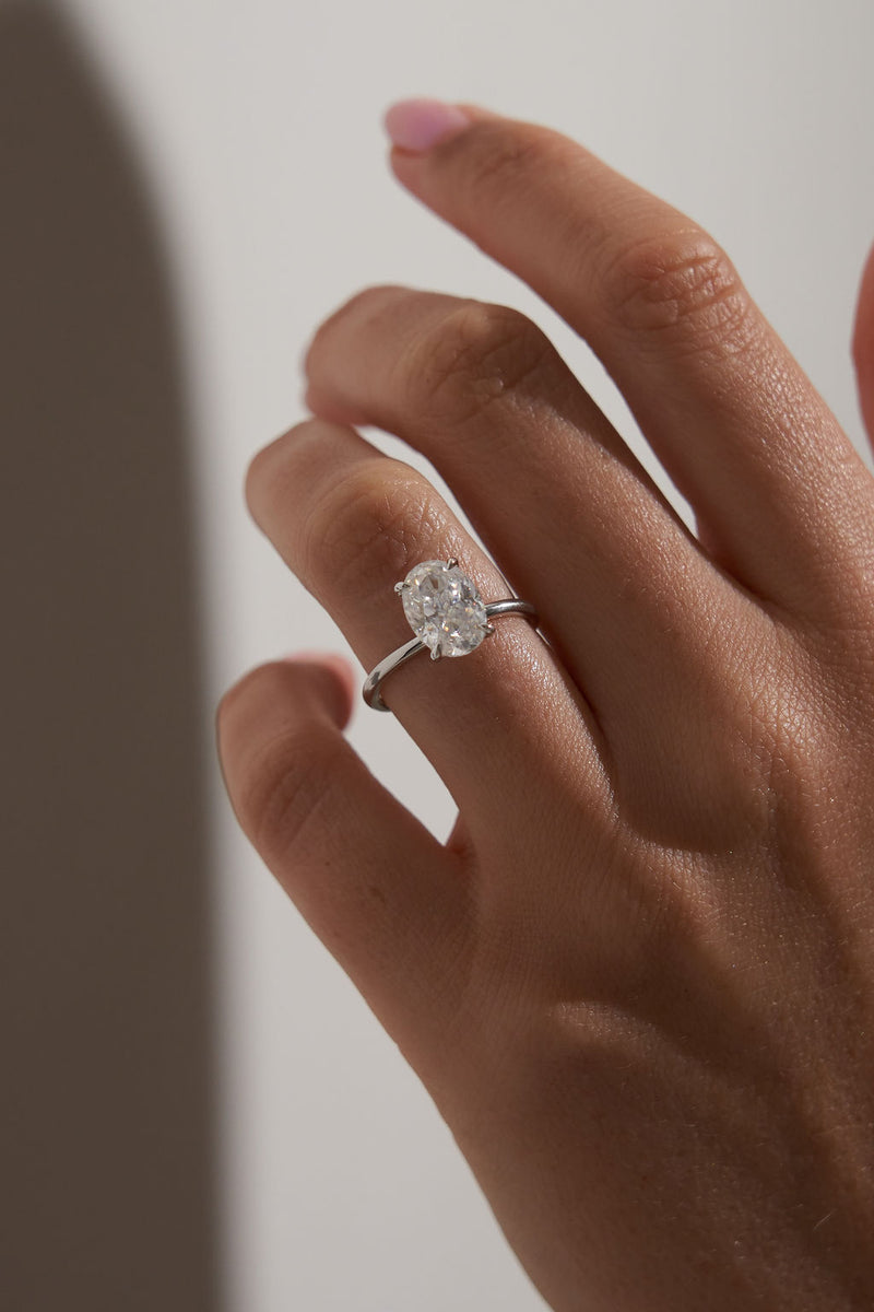4.5 Oval Solitaire Engagement Ring 18k White Gold